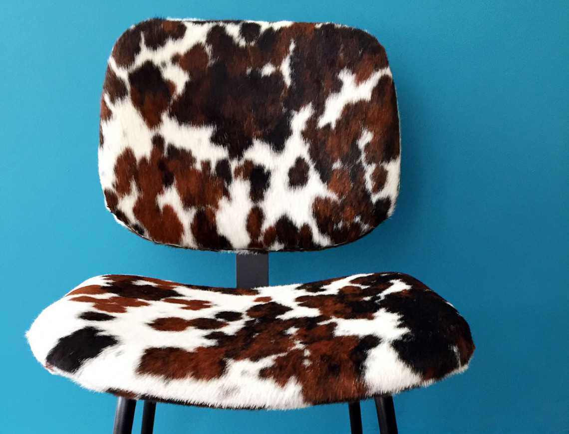 Normandy cowhide chair "Pompon" by Sonia M