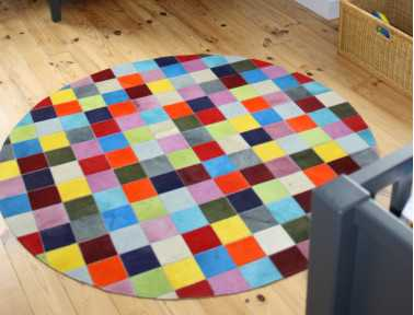 Elmer Round Patchwork Rug in Plain Multi-Colored Cowhide