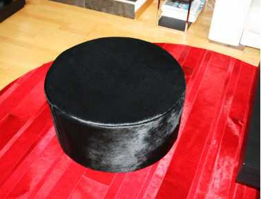 Bilbao Round Pouf in Black Dyed Cowhide