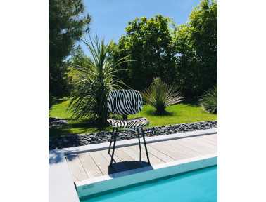 Chaise en peau de vache Zèbre "Pompon" by Sonia M